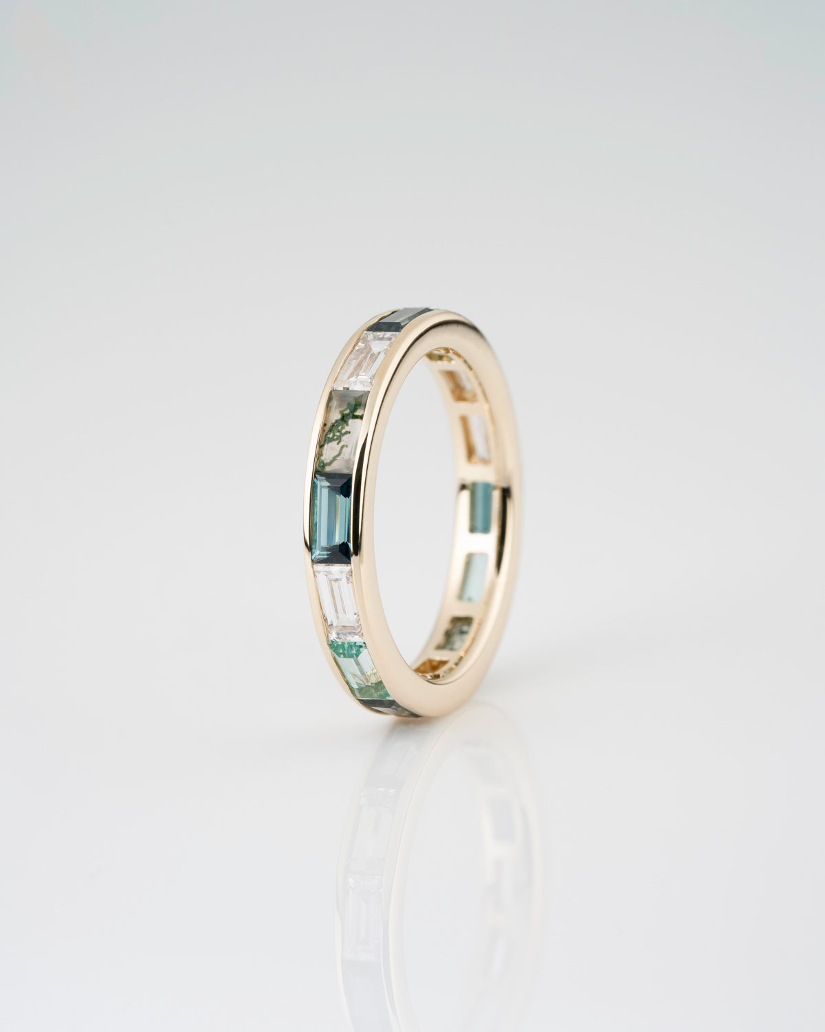Channel Set Diamond and Green Sapphire, Moss Agate, Beryl, and Green Tourmaline Wedding Band.