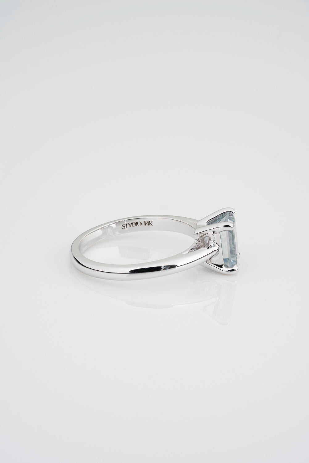 Custom Starbrite Cut Rectangular Sapphire Solitaire Engagement Ring. Setting has a prong setting and is set in a 14k White Gold Setting.