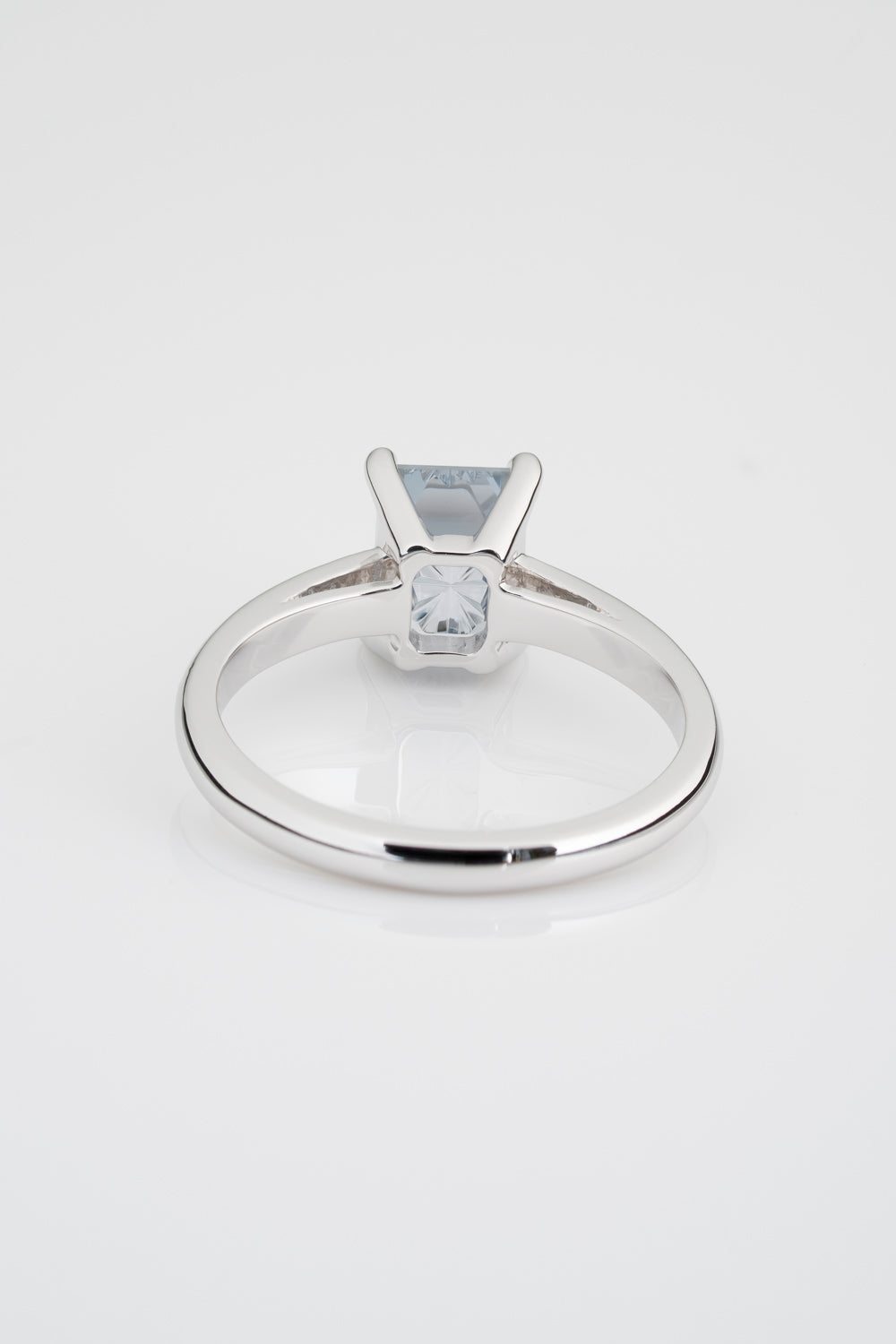 Custom Starbrite Cut Rectangular Sapphire Solitaire Engagement Ring. Setting has a prong setting and is set in a 14k White Gold Setting.