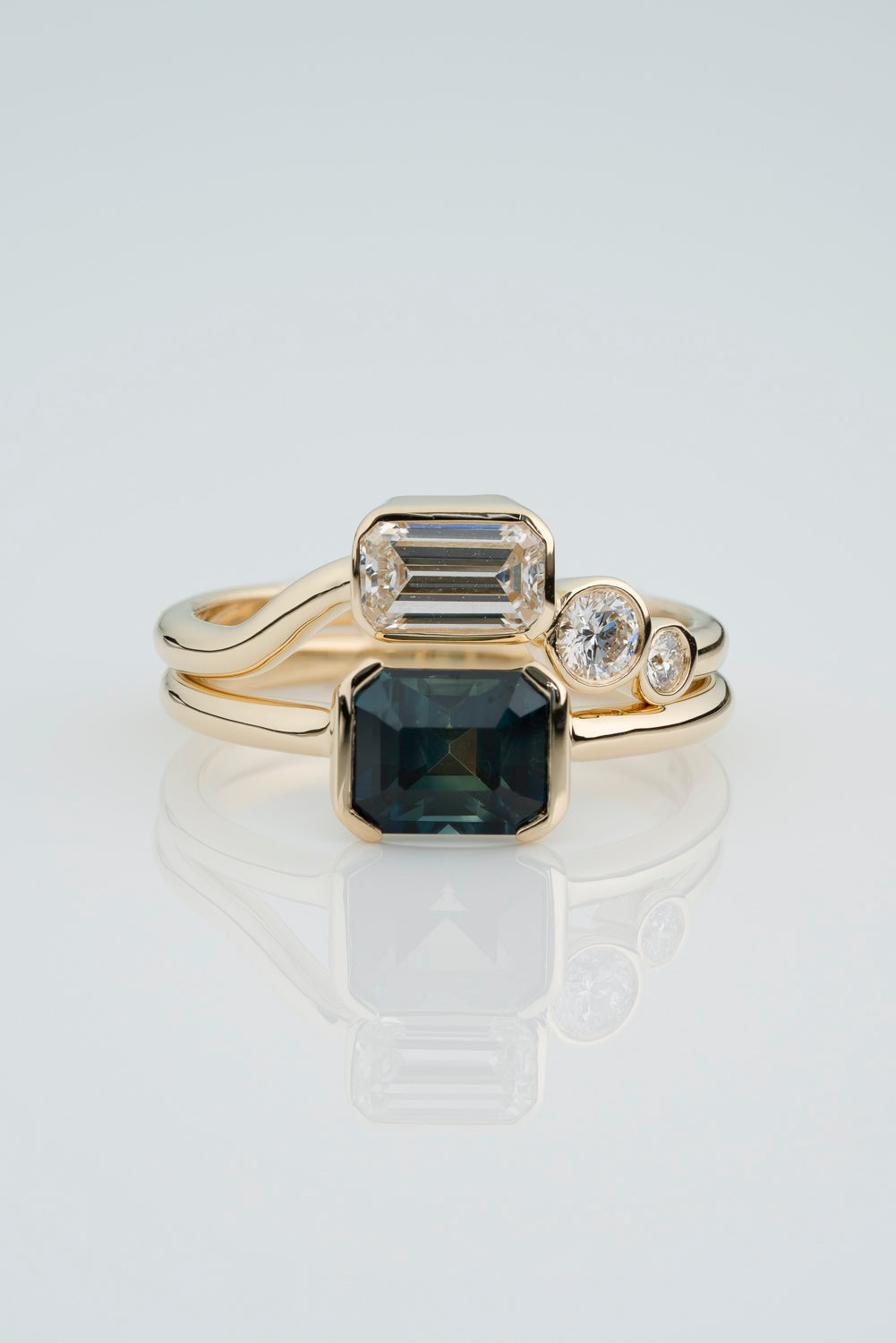 Custom Bezel Set Green Sapphire Solitaire with Bezel Set White Diamond Nesting Band.