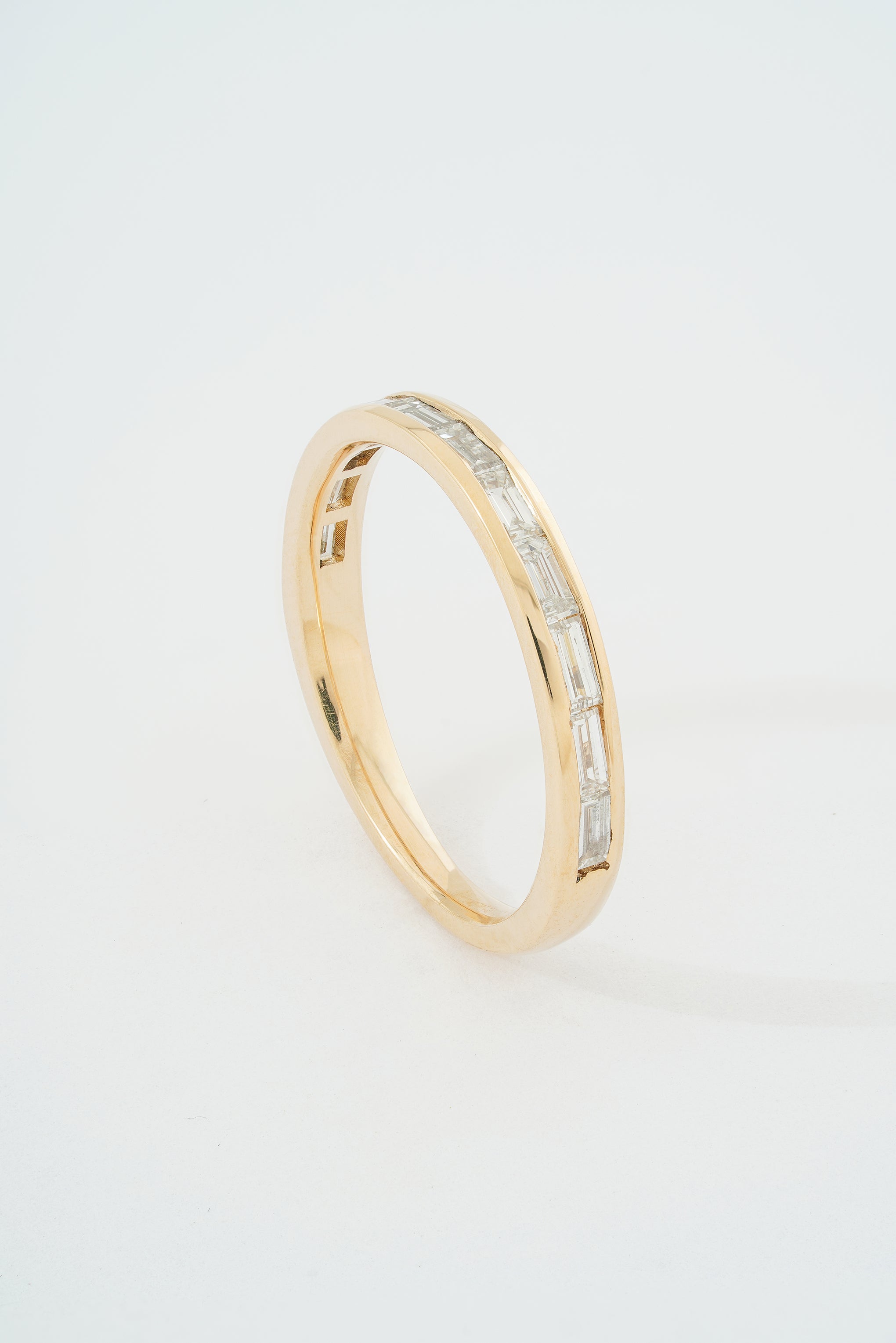 TAPERED EAST WEST BAGUETTE BAND