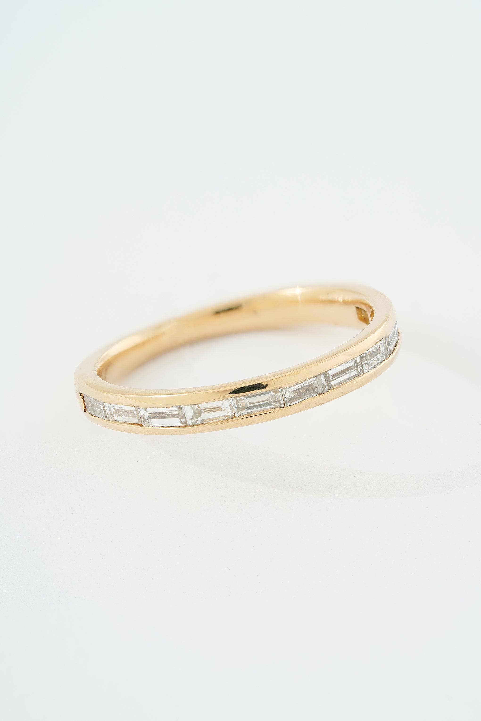 TAPERED EAST WEST BAGUETTE BAND